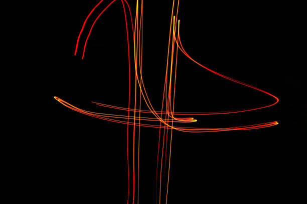 istock Creative conceptual fine art photography motion blur sparkle light trail on dark background copy space for text. Artistic design by lamp fire flame line at night slow shutter speed of camera exposure. 1271709169