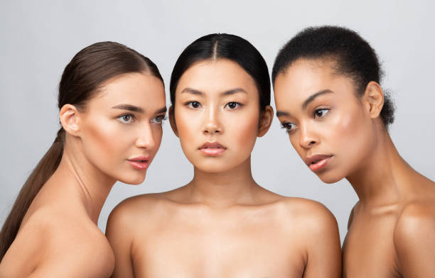 istock Three Naked Women Models Standing Shirtless Posing In Studio 1271710013