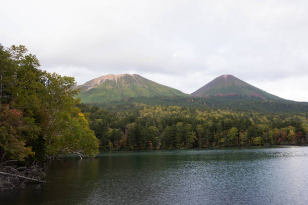 istock Quiet autumn lake in the mountains 1271711660
