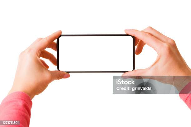 Person Holding In Hands Smartphone With Blank Screen And Taking Picture Or Recording Video Stock Photo - Download Image Now