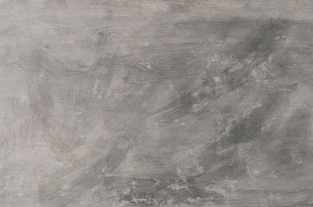 istock Textured concrete background with scratches and black and white spots. 1271719256