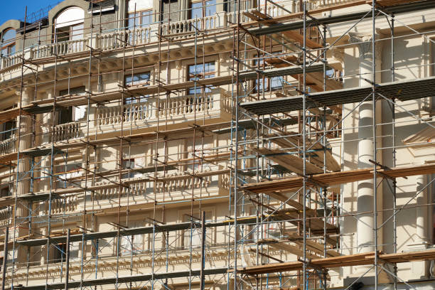 istock scaffolding and new building as background 1271719272