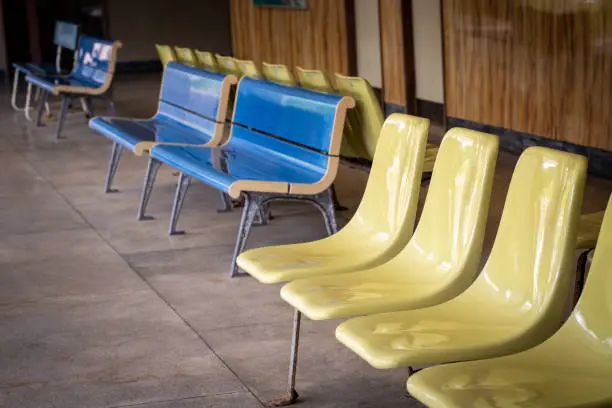 Photo of Old plastic benches at bus station