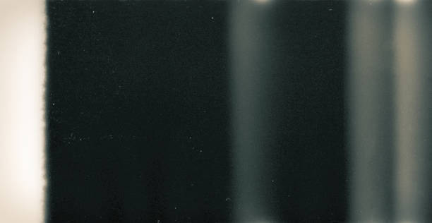 istock Noisy film frame with heavy noise, dust and grain 1271720283