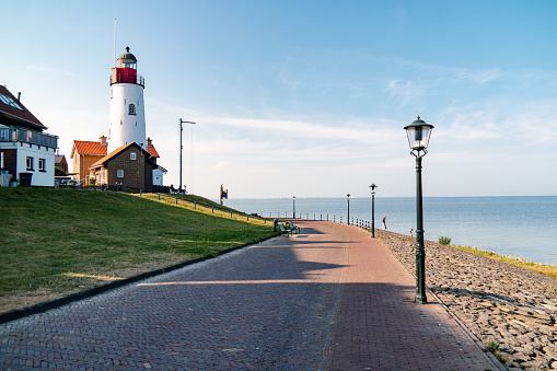 Urk Netherlands harbor and lighthouse near the beach on a bright summer day Flevoland Urk Netherlands Europe