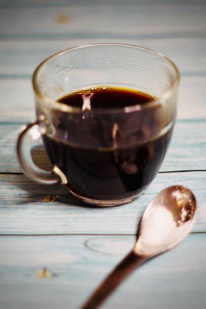 istock Cup of coffee with a teaspoon of sugar 1271723612