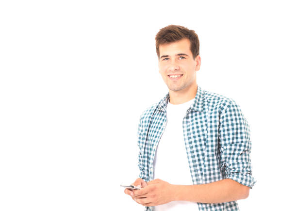 istock Handsome young student chatting on phone in plaid shirt isolated on white. Copy space and mock up 1271726817