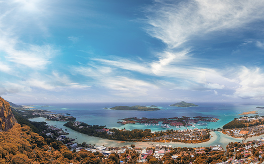 Aerial sunset panoramic view of Mahe coastline and Eden Island, Seychelles.