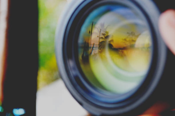 istock Reflection of a tropical beach in a camera lens 1271734256
