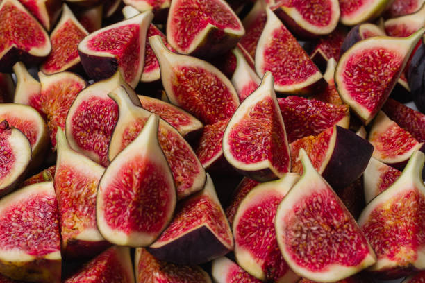 istock Tasty figs background. Top view. 1271738389