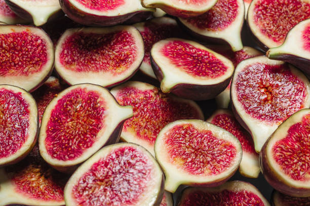 istock Tasty figs background. Top view. 1271738393