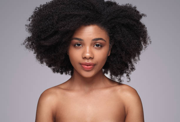 istock Beautiful black female looking at camera 1271739695