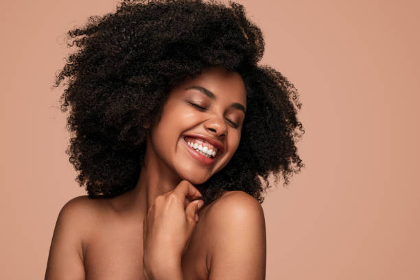 istock Optimistic black lady with perfect skin 1271739743
