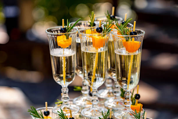 istock A row of champagne glasses. Selective focus with blurred background. Buffet table at wedding. Close up. 1271739745