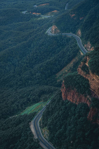 istock The Road In The Mountains In The Setting Sun 1271744771