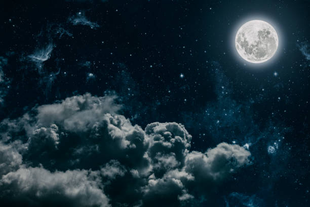 istock backgrounds night sky with stars and moon and clouds 1271748885