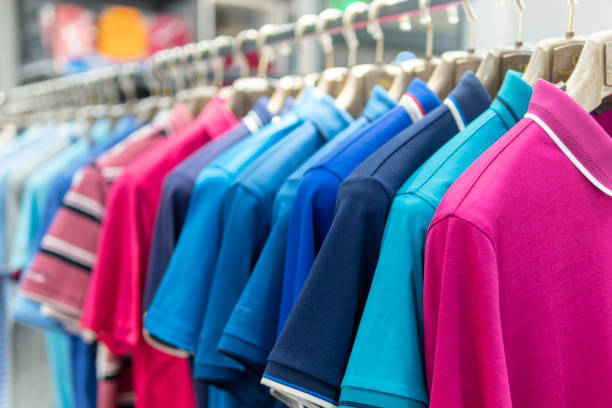 istock Colorful clothes hanging on a hanger in a store 1271749890