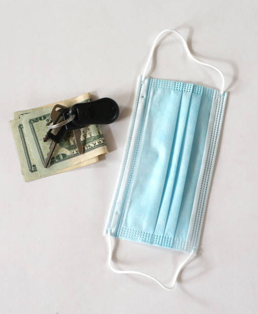 istock Face mask, money and car keys 1271749905