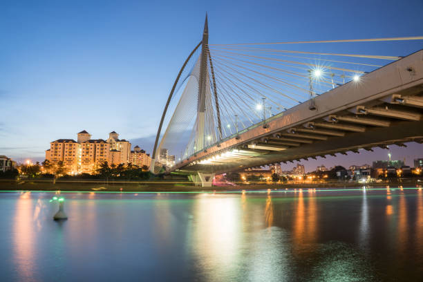 istock bridge at twilight time with clear sky along river 1271750373