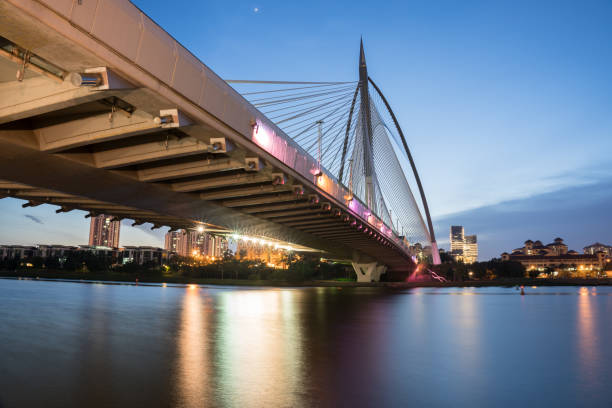 istock bridge at twilight time with clear sky along river 1271750394