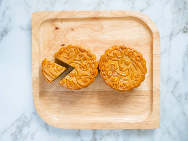 istock Mooncakes on a wooden plate 1271751136