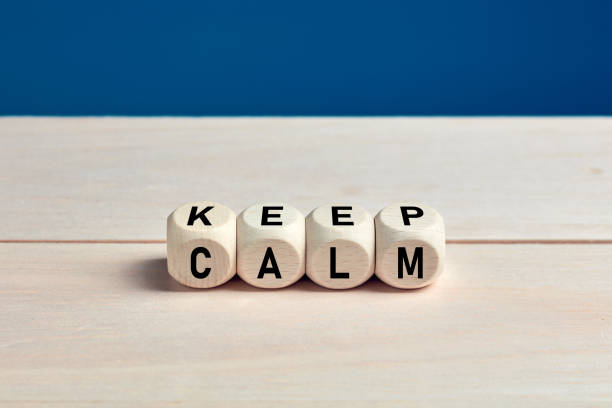 istock Keep calm concept on wooden cubes. 1271752951