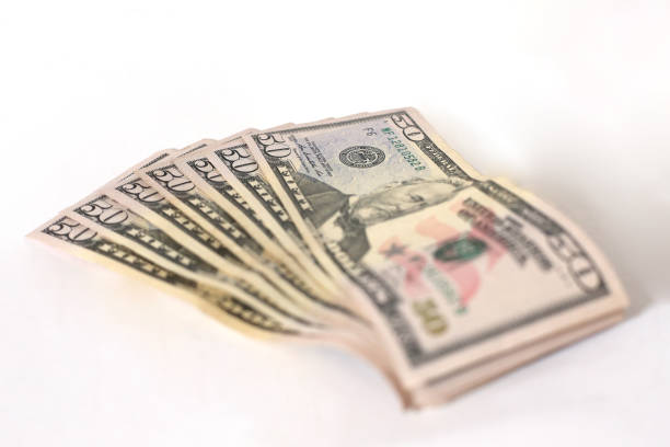 istock A fan of dollar money notes. 1271753011