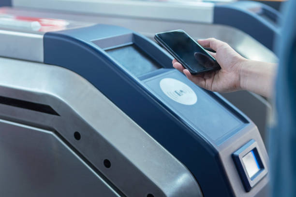 istock An Asian man checking out at metro station using mobile phone with mobile payment 1271753883