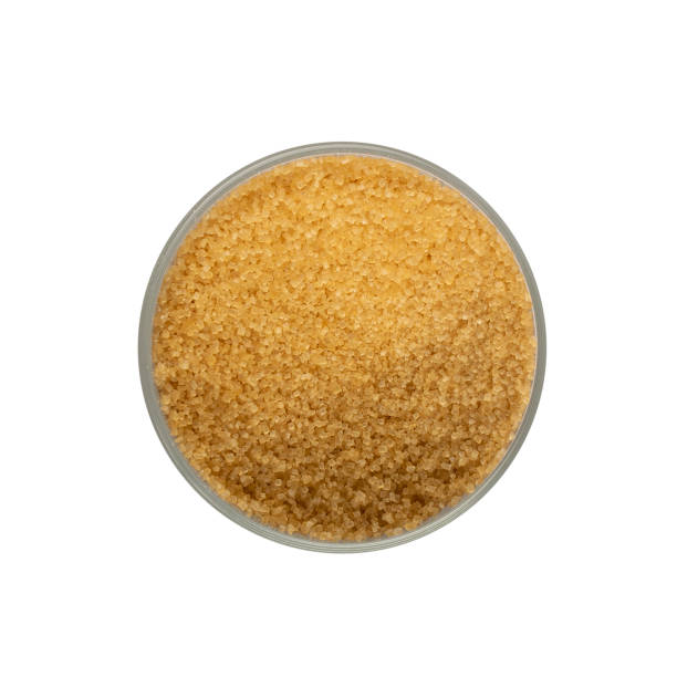 istock Raw Brown Cane Sugar Isolated on White Background 1271754655