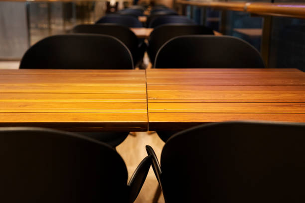 istock Tables and chairs under the light indoors 1271755756