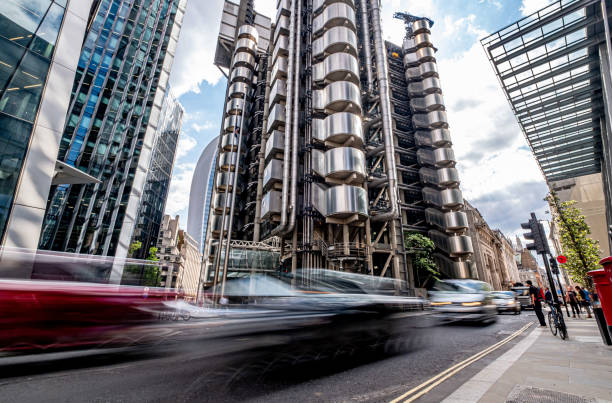 Motion Blur in The City Traffic Moving Fast In front of Lloyds of London Building, City of London lloyds of london photos stock pictures, royalty-free photos & images