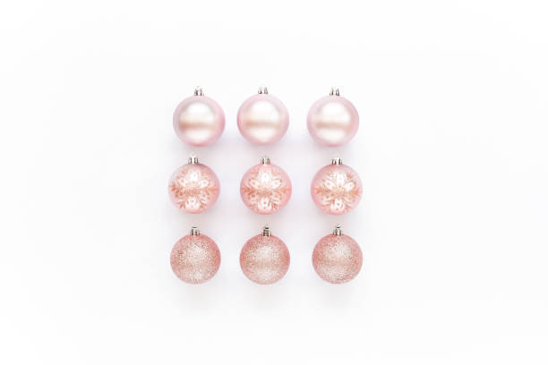 istock Christmas decoration: pink glass christmas balls on white background. flat lay, top view 1271759631