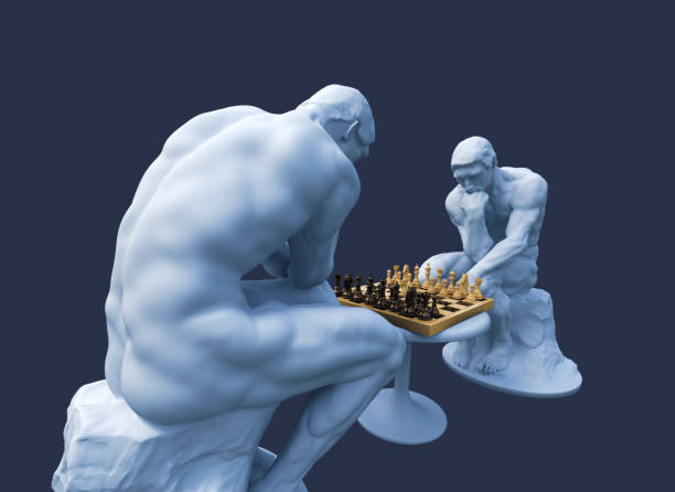 istock Two Thinkers Pondering The Chess Game On Blue Background 1271759887