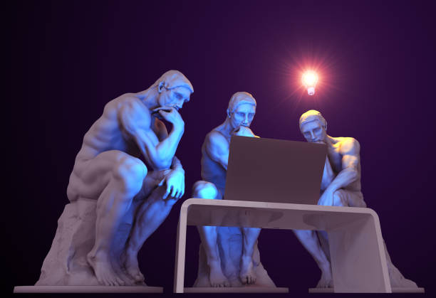 istock Three thinkers with a computer and one of them has a glowing light bulb above his head as a symbol of a new idea 1271759936