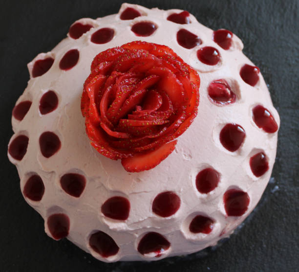 istock delicious creamy raspberry strawberry cake 1271760170
