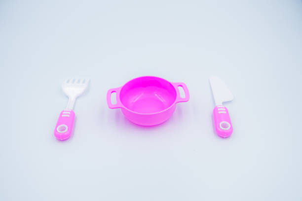 istock Children's pink plastic cooker for cooking on a white background 1271761216