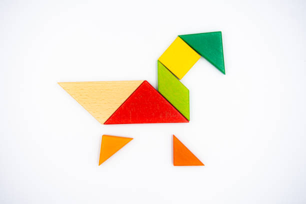 istock Color wood tangram puzzle in Duck shape on white background 1271761229