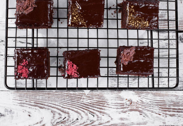 istock Set of brownie cakes with ganache and assorted toppings 1271761406