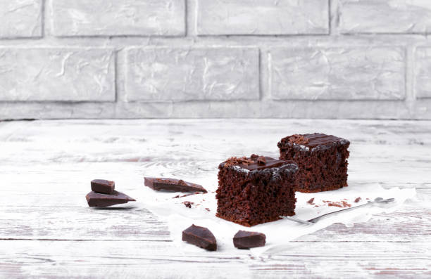 istock Piece of chocolate cake topped with ganache 1271761407