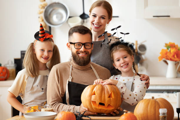 istock Delighted family during Halloween celebration 1271765710