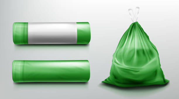 Trash bag mockup, plastic roll, sack with garbage. Trash bag mockup, plastic roll and sack full of garbage. Green disposable package for rubbish mock up. Household supplies for waste throw isolated on grey background. Realistic 3d vector illustration bin bag stock illustrations