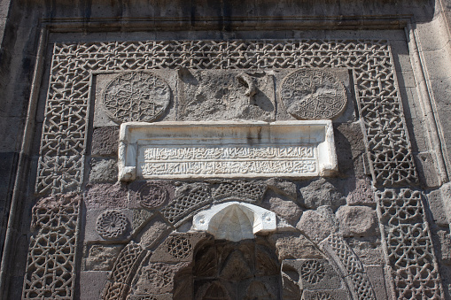 An exterior detail from the 13th-century Gevher Nesibe hospital and medical school in Kayseri, Turkey.