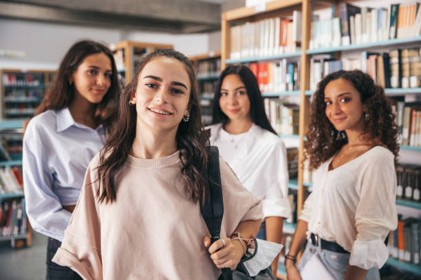 istock Confident women students in the public library 1271771274