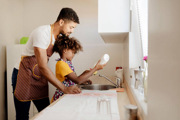 istock Getting kids involved in lending a hand around the house 1271772348