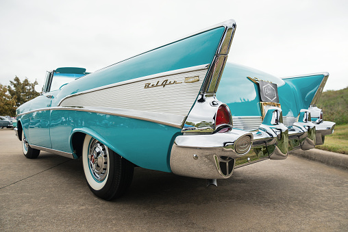 Westlake, United States - October 21, 2017: Back side view of an aqua color 1957 Chevrolet Bel Air convertible classic car.