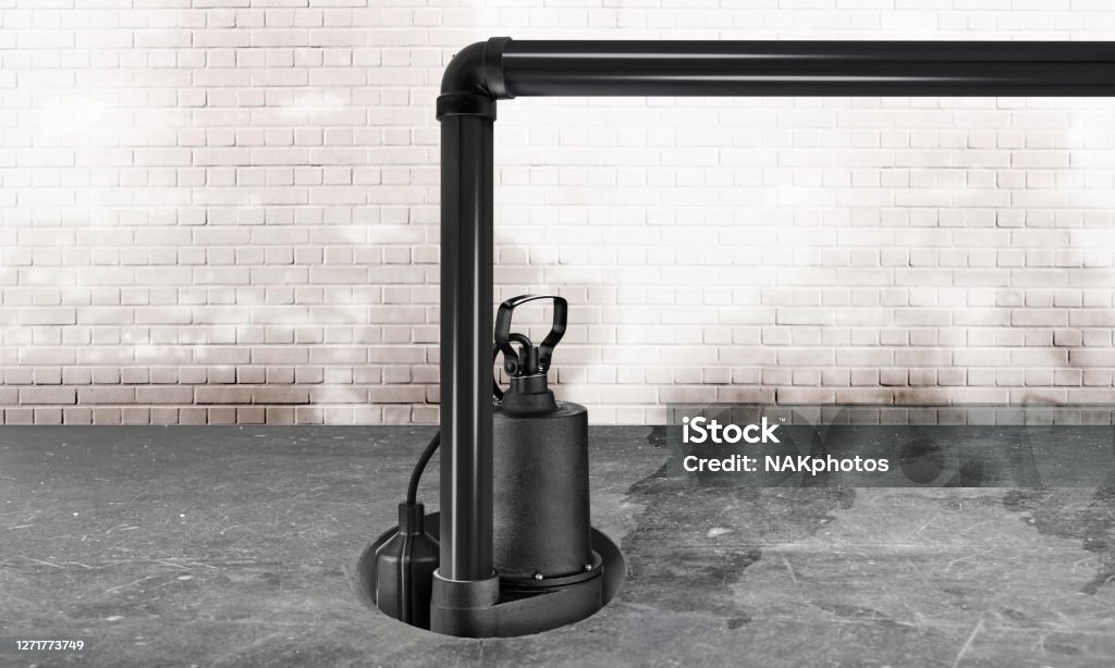 Submersible water Pump for flood prevention in a wet basement floor Submersible water Pump for flood prevention in a wet and dark concrete basement Water Pump Stock Photo