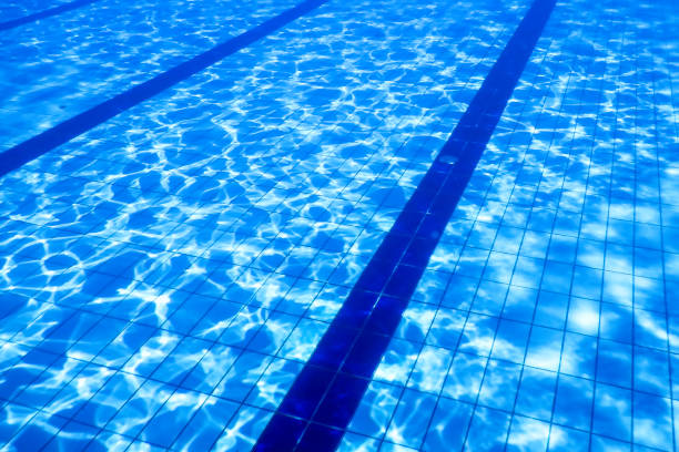 istock Swimming Pool water. Ripple Water. Sun Reflection background. 1271774299