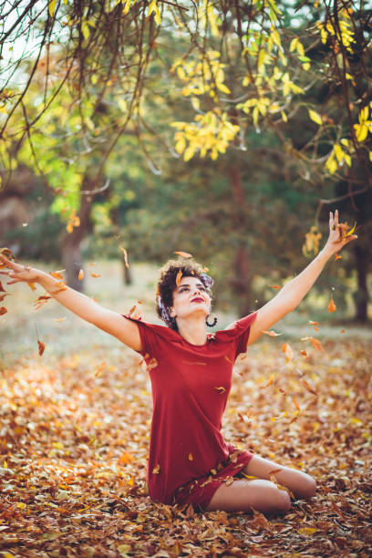 istock Throwing leaves in the air 1271777783