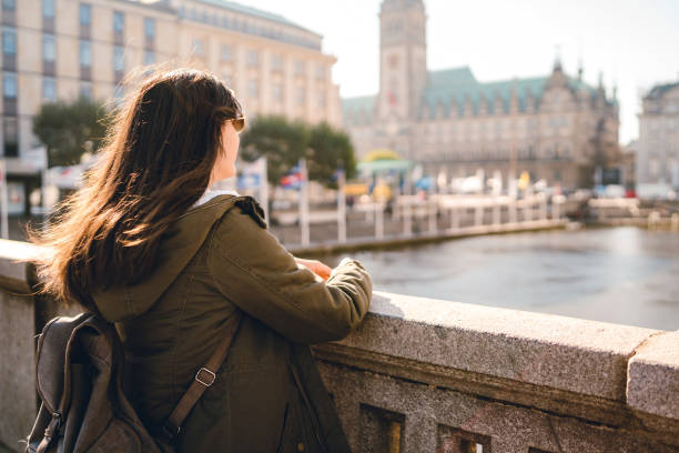 istock Female tourist enjoying view from bridge 1271777989