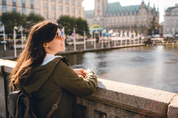 istock Female tourist enjoying view from bridge 1271778014